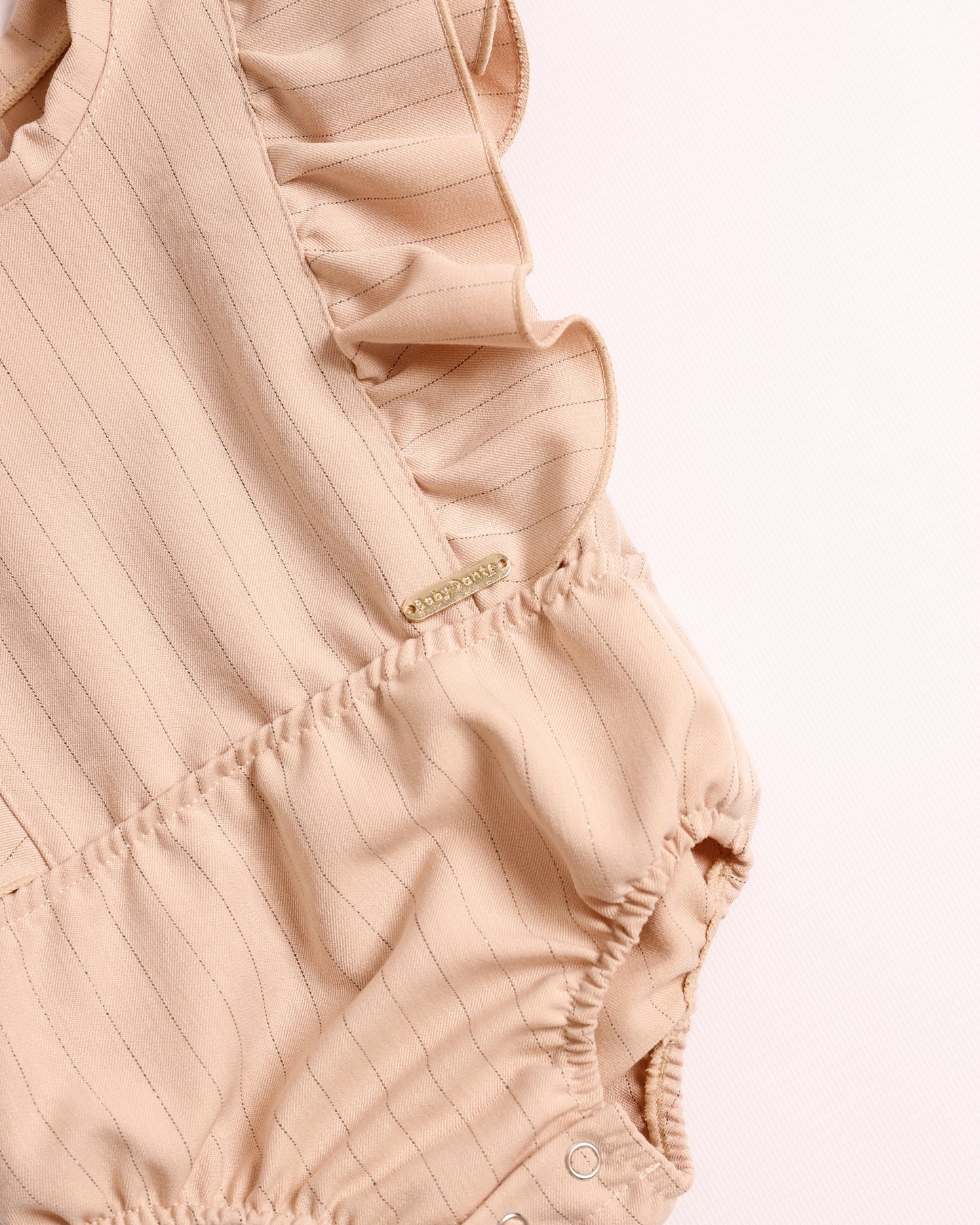 ENTERIZO IRIS CAMEL RAYAS