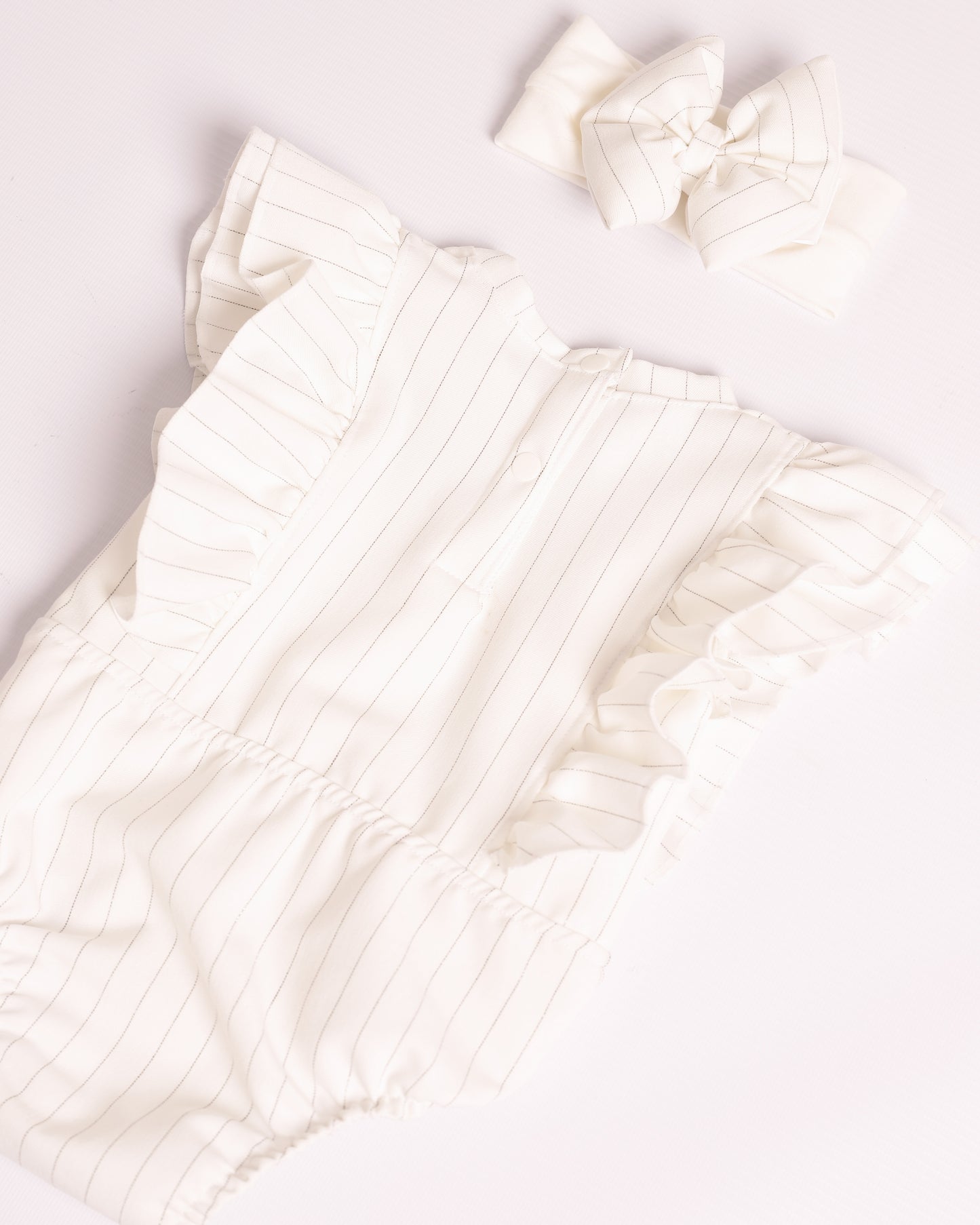 ENTERIZO IRIS BLANCO RAYAS