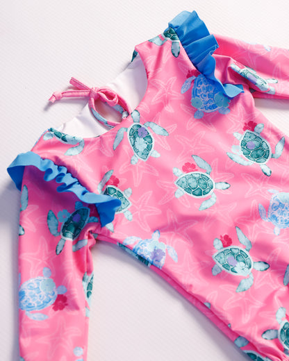 VESTIDO DE BAÑO FUCSIA TORTUGAS