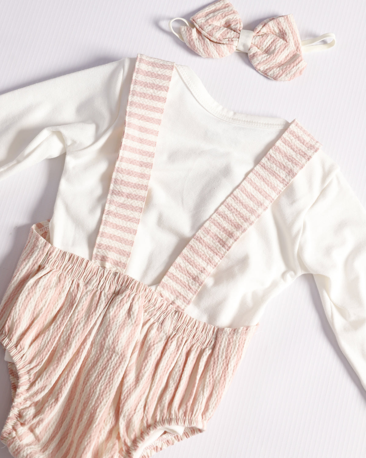 OVEROL SAM LINEAS ROSADAS M/L